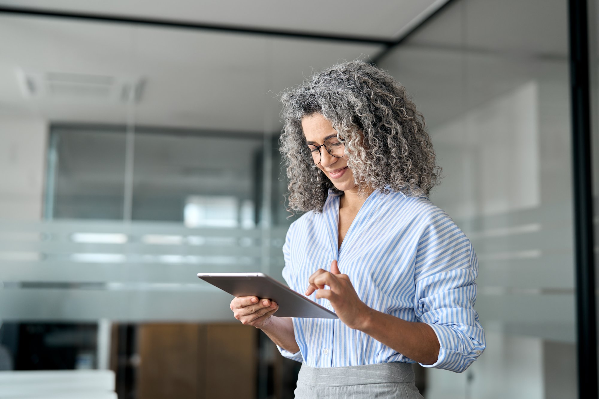 Female Professional Looking at a Tablet